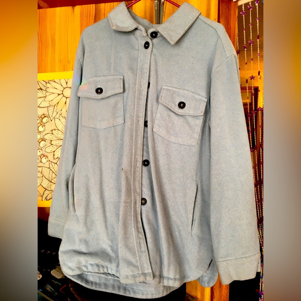 Light blue, fleece jacket.